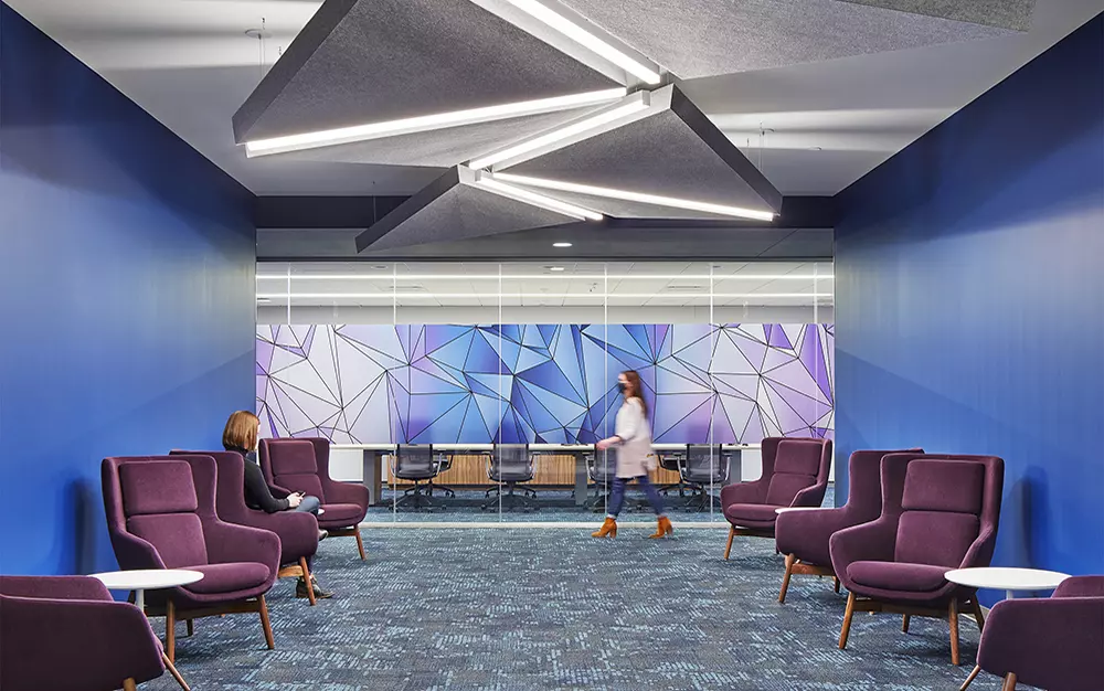 Woman walking through project room