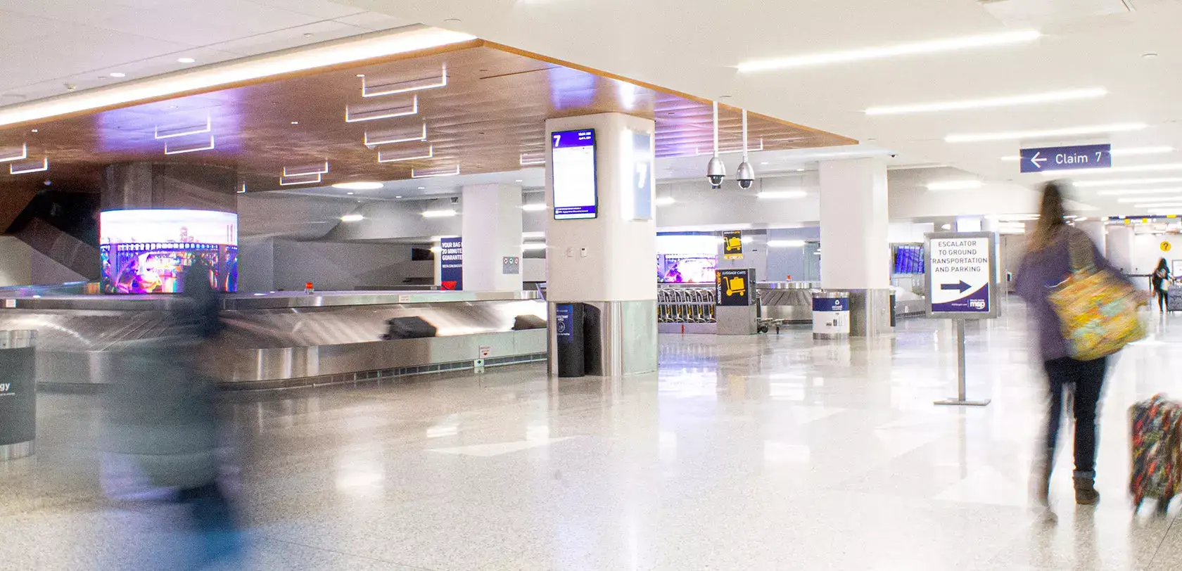 Woman at the baggage claim hall